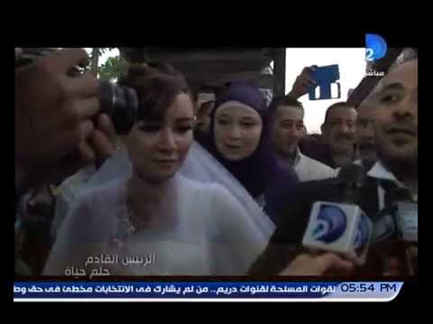 عروسان يقيمان زفافهما أمام لجنة انتخابية في السيدة زينب
