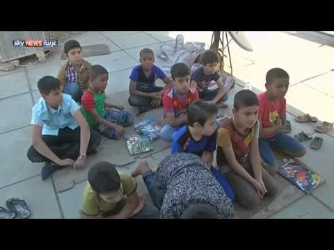 فصل دراسي لليتامى على سطح عمارة