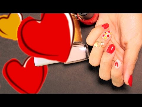 مناكير حمراء مزينة بقلوب مع بيكا