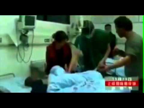 أم صينية تشعل النار بطفلها انتقاما من الزوج